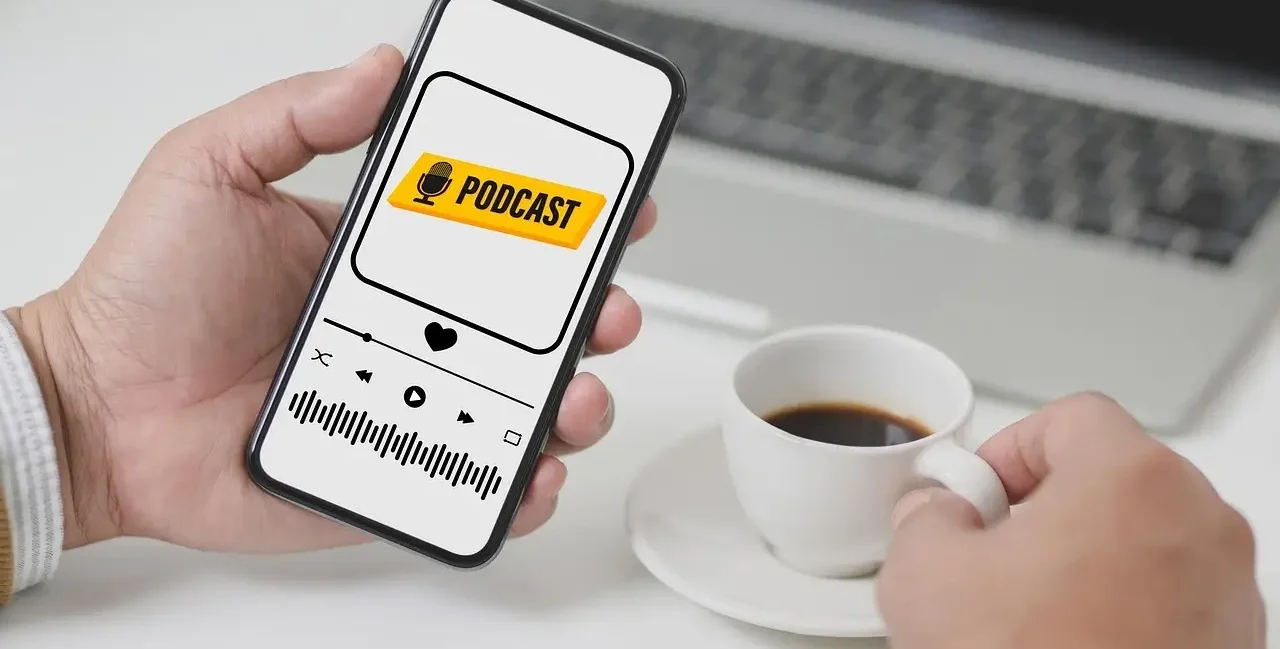 Listening to True Crime vs. Educational Podcasts on a phone with a cup of coffee, explore both worlds on yesversusno.net.