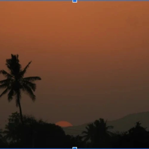 Rise and shine: golden sunrise over calm hills, morning motivation — yesvsno.net