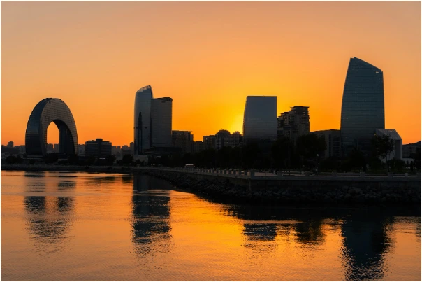 Rise and shine: modern city skyline at sunrise, wake up quotes vibe — yesvsno.net