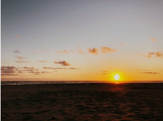 Rise and shine: sunrise over a serene beach, morning motivation — yesvsno.net