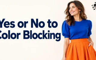 a person wearing a bold two-color color-blocked outfit, like a bright blue top with an orange skirt, standing against a plain light background, soft natural light, bright and modern photography style.