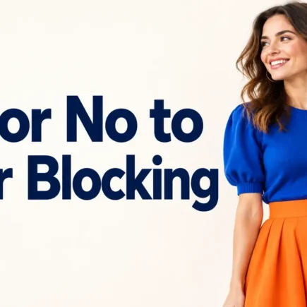 a person wearing a bold two-color color-blocked outfit, like a bright blue top with an orange skirt, standing against a plain light background, soft natural light, bright and modern photography style.